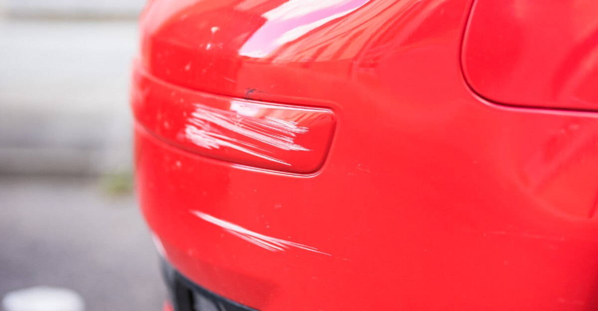 Scratches On Red Car
